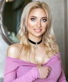 profile of Russian mail order brides Romi